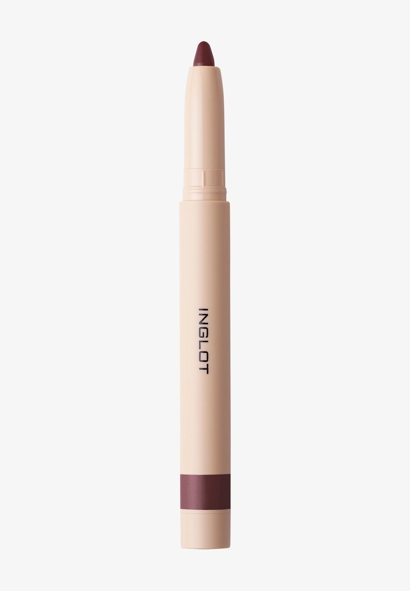 Crayon de maquillage beige rétractable avec une pointe et une bande mauve foncé, texte noir "INGLOT" sur le côté.