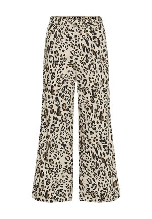 Leopárdmintás, bő szárú nadrág rugalmas derékkal. Az anyag sima tapintású, semleges bézs háttérrel, fekete és barna foltokkal.