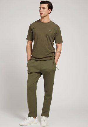 Pantaloni sportivi - grün