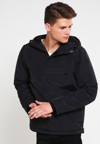 Urban Classics - PADDED PULL OVER JACKET - Lehká bunda - black Miniatura obrázku 1