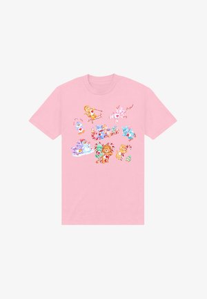 Lyserød T-shirt med korte ærmer, der viser farverige tegneserie-dyr med sukkerrør i forskellige legende positurer på forsiden.