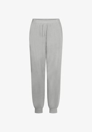 Lichtgrijze joggingsbroek van zachte stof, met een relaxed fit, elastische tailleband en taps toelopende boorden bij de enkel.