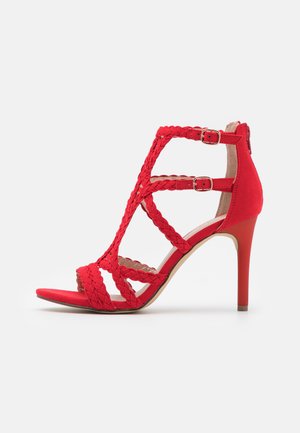 High heeled sandals - light red
