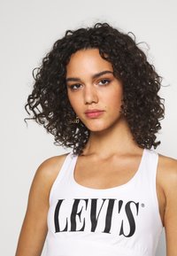 Levi's® LOGO SPORTS BRA - Top - white