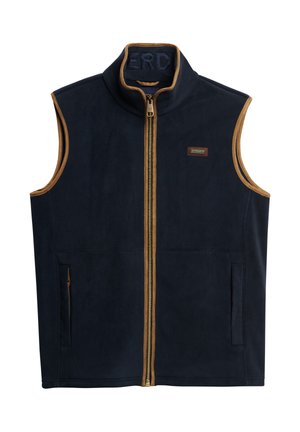 Navy fleece vest met een hoge kraag, gouden rits en bruine accenten. Heeft twee zijzakken en een merkembleem nabij de rits.