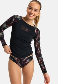 Černý dlouhý rukáv rash guard s barevnými květinovými vzory na rukávech, s logem Roxy. V kombinaci s odpovídajícími černými bikinovými kalhotkami.
