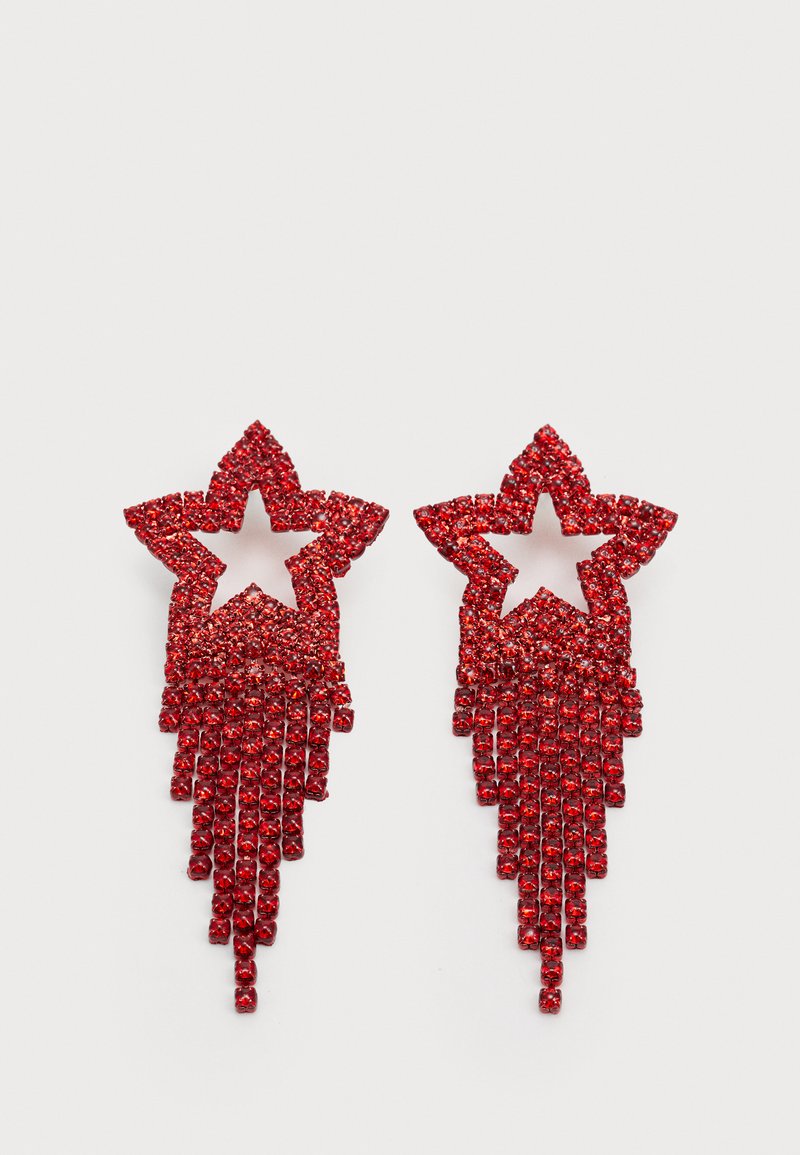 Red star-shaped earrings adorned with shimmering rhinestones, featuring cascading fringe details. The material is shiny and faceted.