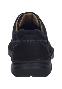 Sorte ruskinds loafers med en rund tå, kontrasterende syninger og en gummisål, som har en blød tan-foring indeni.