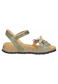 Grüne Leder-Wedge-Sandalen mit floralen Akzenten, Korkfußbett und schwarzer Gummisohle. Mit überkreuzten Riemen und einer weichen Textur.