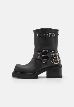 STUBBORN - Platform ankle boots - black