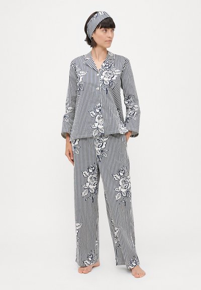 Striped blue and white pajama set with floral patterns; features a button-up top, wide sleeves, and loose-fitting pants. Includes a matching headband.