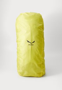 Yellow waterproof storage bag with a smooth texture, cylindrical shape, and black logo on the front. Compact and lightweight design.