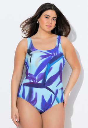 Maillot de bain une pièce avec un motif floral bleu et violet. Fabriqué en tissu lisse, il possède de larges bretelles et une encolure arrondie.
