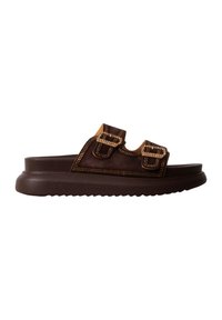 Sandale mule marron avec deux brides réglables à boucle et une semelle épaisse rainurée.