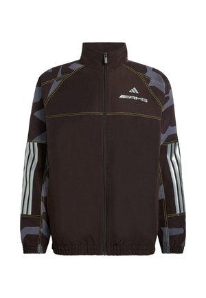 Black zip-up jacket with a high collar, featuring gray camo sleeves and reflective branding. Elastic cuffs and hem with yellow stitching accents.