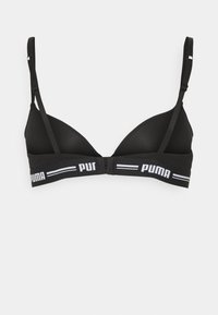 Black triangle bra with adjustable straps, featuring a wide elastic band with white "PUMA" logo and horizontal white stripes. Smooth texture.