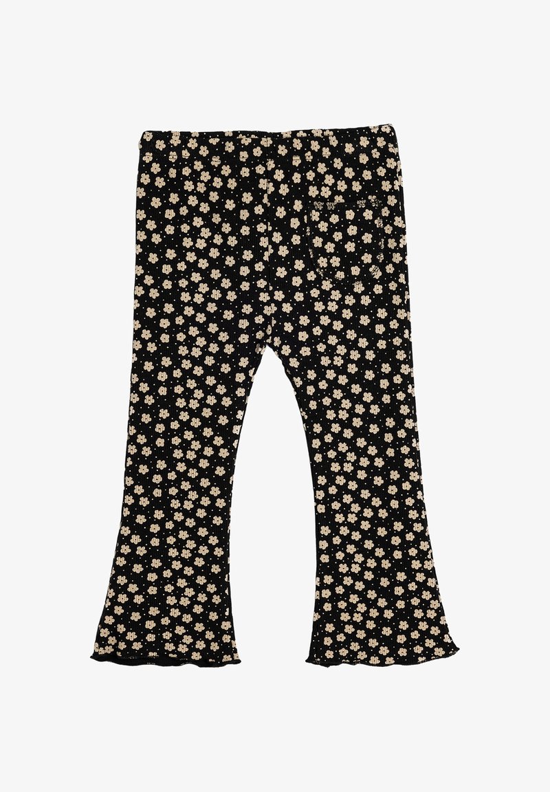 Sorte flared leggings med ribbet tekstur og et blomstermønster i creme. Har en elastisk talje og en enkelt baglomme.