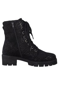 Bottines noires en tissu texturé avec un décor floral embossé, dotées de lacets, d'une fermeture éclair sur le côté et d'une semelle épaisse.