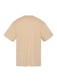 T-shirt in cotone beige con maniche corte, vestibilità comoda, scollatura rotonda e design semplice. Nessun motivo o dettaglio hardware visibile.