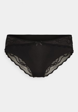 Melna apakšveļa ar gludu virsmu un mežģīņu akcentiem jostasvietā un sānos, ar viļņotu malu un mazu centrālo loku detaļu.