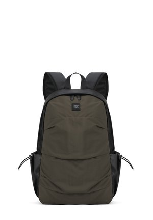 Backpack with a matte olive green fabric body and black accents. Features padded shoulder straps and a top carry handle. Front zip pocket.