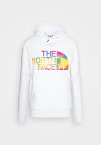Felpa con cappuccio bianca con una tasca a marsupio, caratterizzata da un logo testuale multicolore "THE NORTH FACE" e un design distintivo a mezza luna.