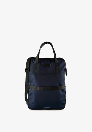 Navy blue rectangular water-repellent bag with black handles, adjustable shoulder strap, front pocket, and zip closure.