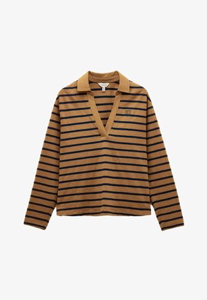 Brūna garām piedurknēm krekls ar tumši zilu horizontālu svītru, dziļu V veida kaklu un apkakli. Mazs logotipa elements kreisajā krūtī. Mīksts, brīvs piegriezums.