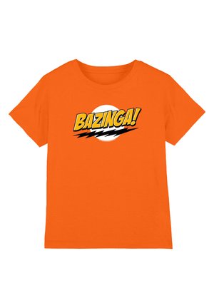 Orange short-sleeve t-shirt with "BAZINGA!" in bold yellow letters over a white circle and black lightning bolt graphic on the chest.