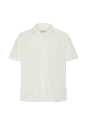 Chemise à manches courtes, de couleur crème, boutonnée, avec un col camp, présentée sur un fond blanc uni.