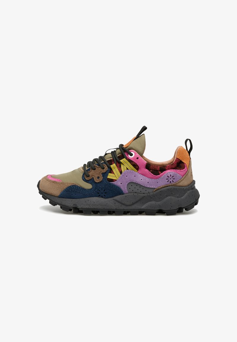 Colorful sneaker featuring a mix of materials including suede and mesh. Designs in green, pink, blue, and purple with textured soles.