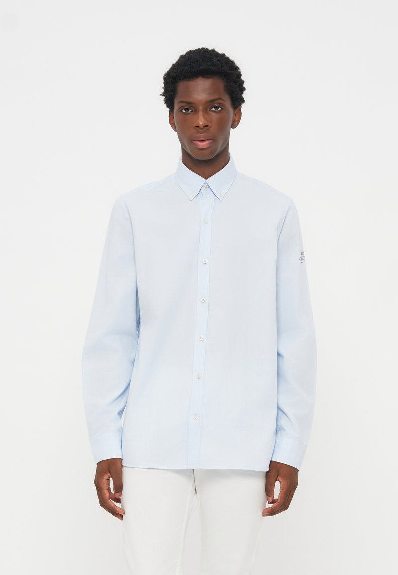 Camisa