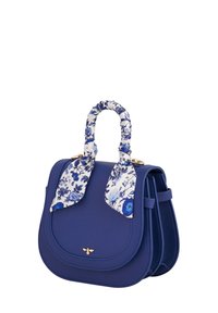 Blue structured handbag made of smooth material, featuring a floral-patterned scarf tied to the top handle and gold-tone hardware accents.