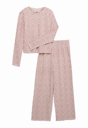 Pyjamaset bestaande uit een top met lange mouwen en een broek, met een witte achtergrond en een klein rood-groen bloemmotief.