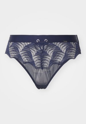 Navy blue lace brief with a floral pattern, featuring a satin waistband and silver grommets, textured mesh at the front and back.