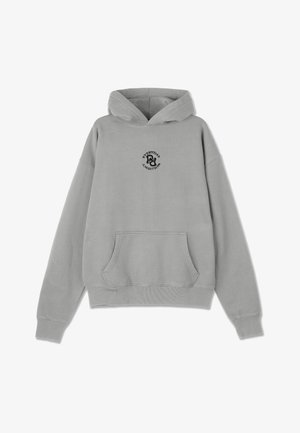 Capuz cinza com um bolso frontal, capuz com cordão e um logótipo preto circular a representar "Ambição Diária" no peito. Tecido macio e texturizado.