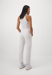 Jordan PANT - Trainingsbroek - sail/black