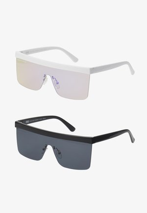 Dva para sončnih očal: ena z belim okvirjem in gradientno vijoličnim lečami ter druga z črnim okvirjem in temno sivo lečo.