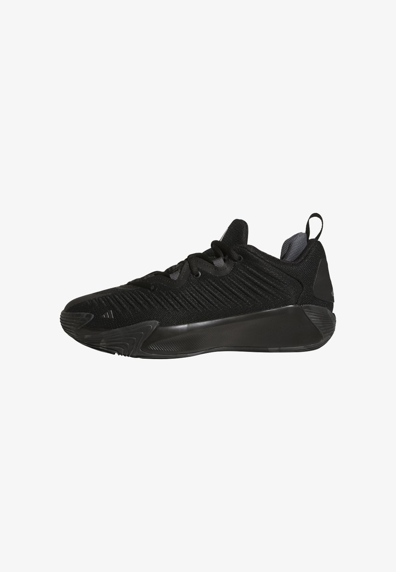 Zapatillas deportivas negras con parte superior texturizada, cierre de cordones y suela de goma resistente. Presentan un tirador en el talón y un branding sutil.