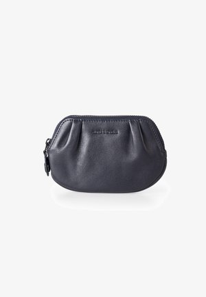Navy leather coin purse with gathered design, zip closure, and embossed logo. Smooth texture with rounded shape and compact size.