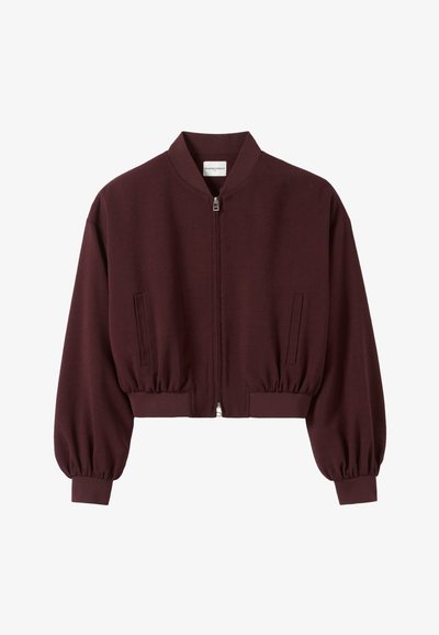 Veste bomber bordeaux avec fermeture éclair à l'avant, poignets et ourlet côtelés, et manches bouffantes. Comprend deux poches latérales et une texture lisse.
