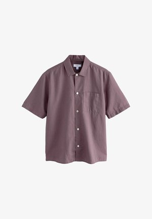 Lühikeste varrukatega nööbiga särk sügavas lilas. Valmistatud kergest kangast, millel on rinnaosa tasku ja viis ümmargust valget nööpi.