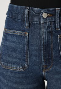 Good American WAIST PALAZZO PATCH POCKETS TROUSER - Wide Leg - indigo