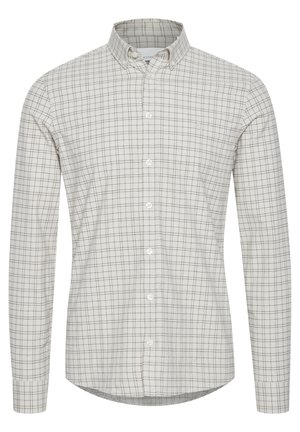 Camicia bianca con un motivo a righe grigie chiare e scure, caratterizzata da maniche lunghe e un design del colletto classico.