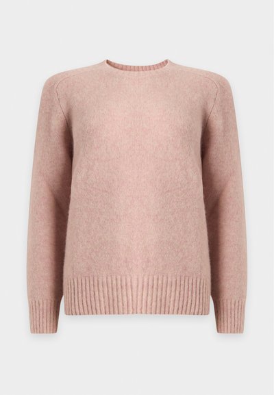 Pull rose doux à manches longues avec col rond, poignets et ourlet côtelés, fabriqué dans un tissu tricoté duveteux.