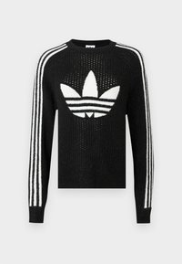 Sweater de malha preto com um logótipo trefoil branco da Adidas e três riscas brancas em cada manga. Tecido texturizado com ligeiro brilho.