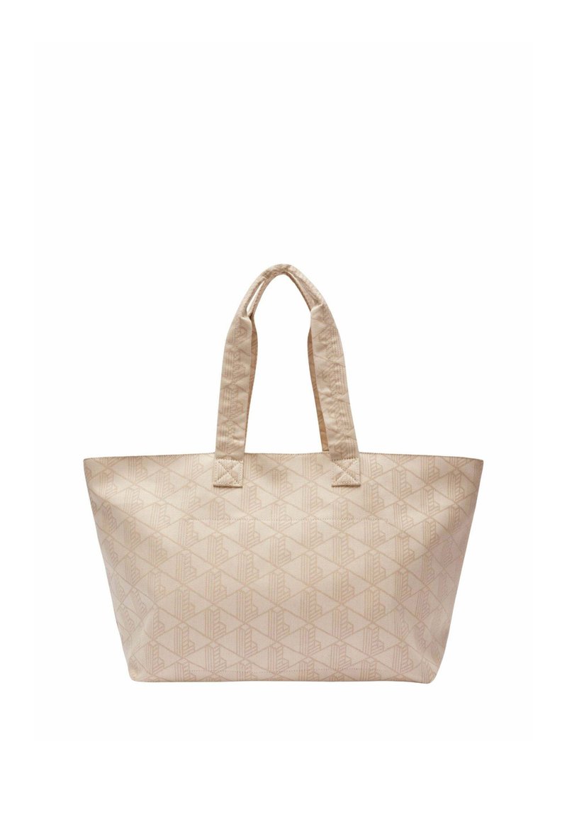 Beige Tragetasche mit dezentem geometrischem Muster und zwei gepolsterten Henkeln, rechteckigem Boden und weicher Stoffstruktur.