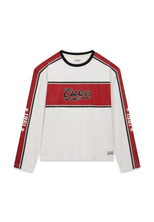 Long-sleeve mesh shirt in white with red accents and black stripes. Features "Guess Jeans" logo in the center and a sporty design.