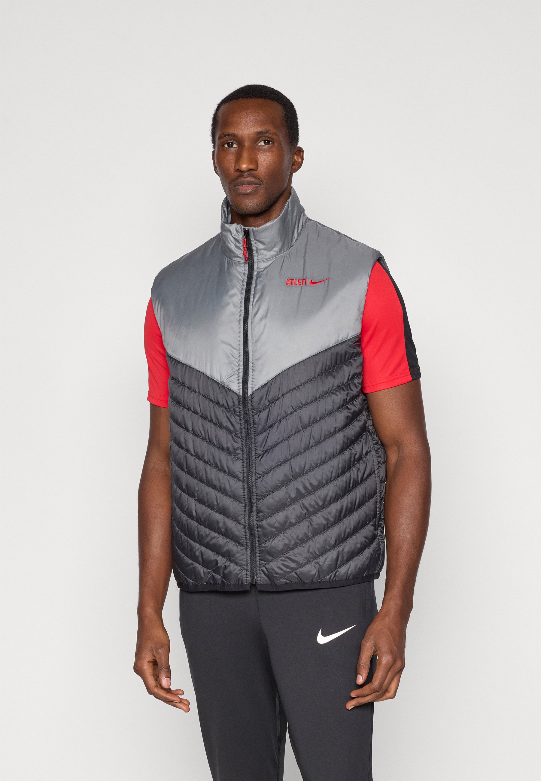 nike sleeveless jacket