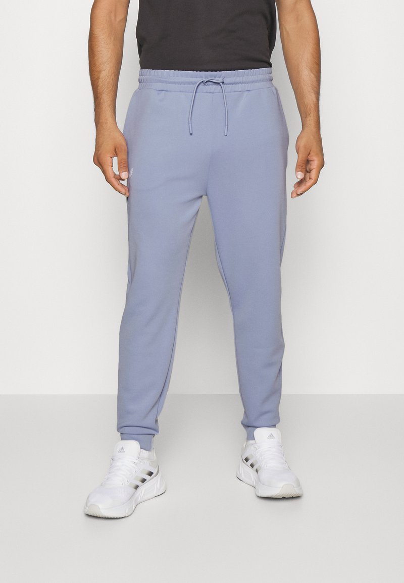 Castore SCUBA JOGGERS Pantalon de survêtement sky/bleu ZALANDO.FR